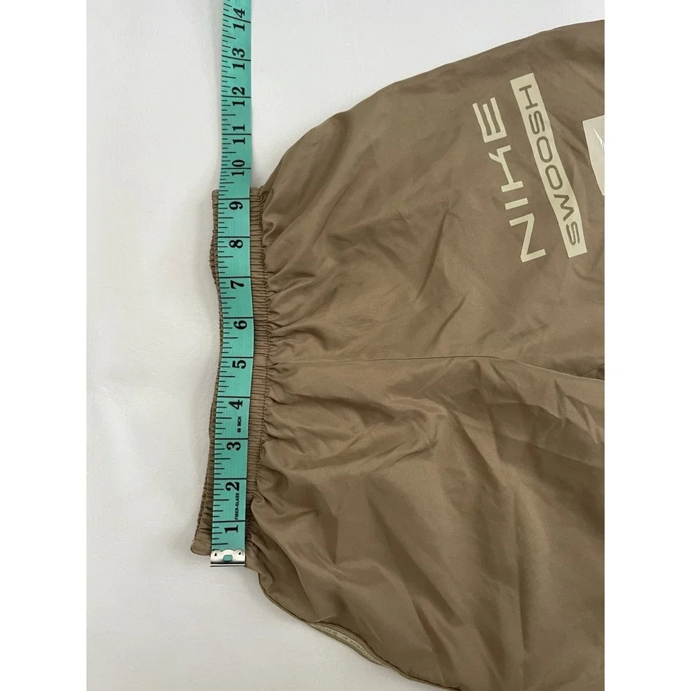 Nike Boys Size 6 Dri-FIT Parachute Khaki Swoosh Graphic Athletic Shorts Unlined